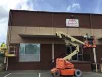 Commercial power washing and paint project completed for Purnell Warehouses